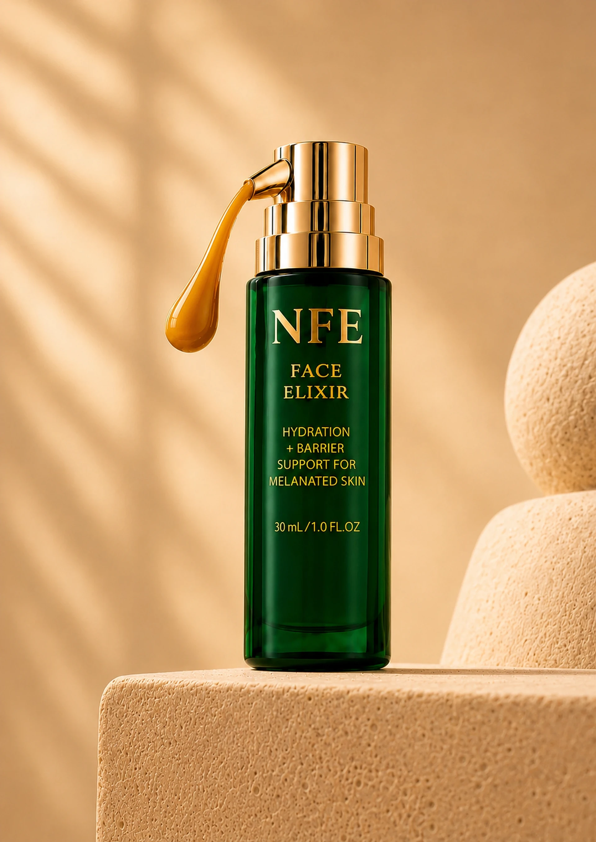 NFE Face Elixir bottle with gold pump in a warm sculptural setting.